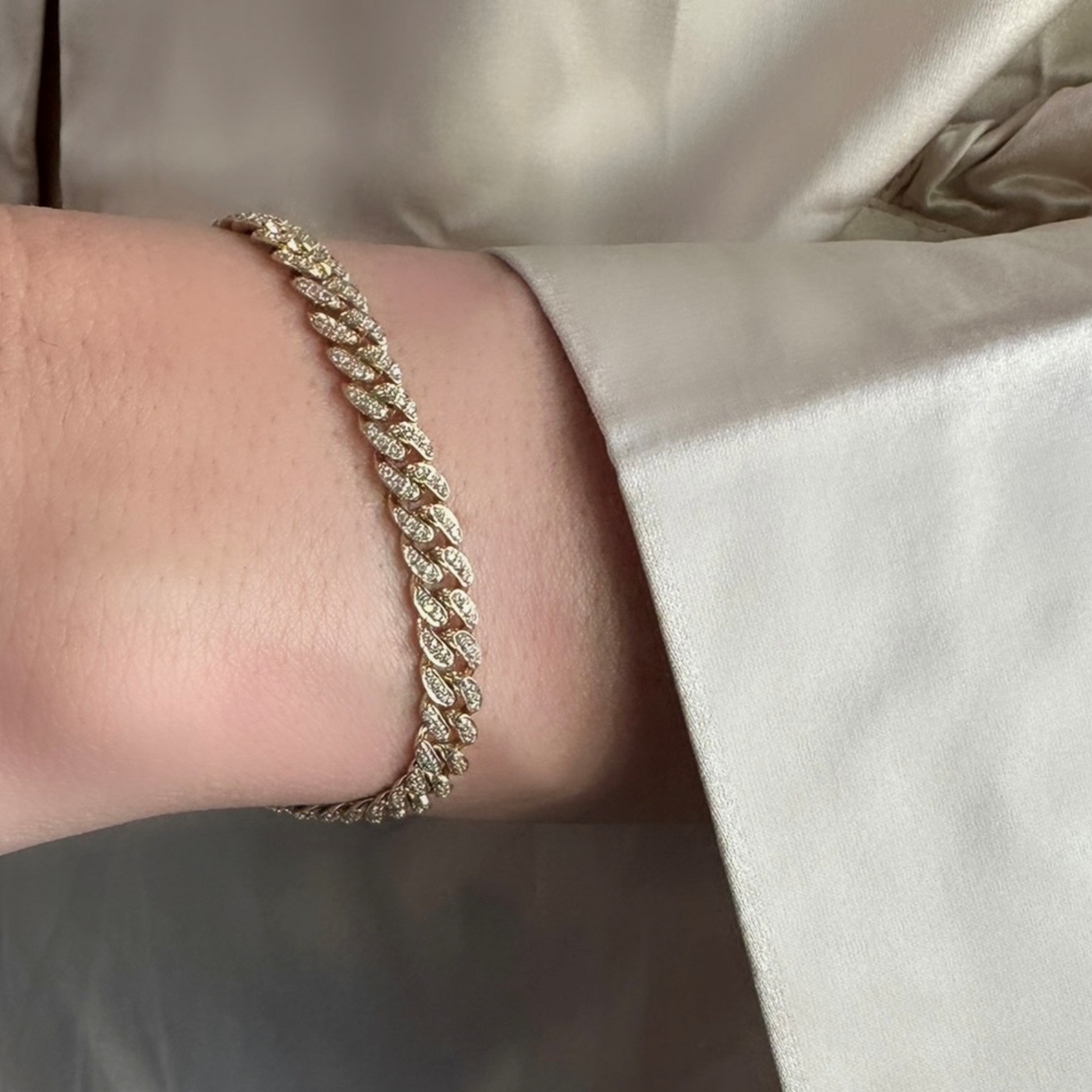 diamond covered cuban link bracelet