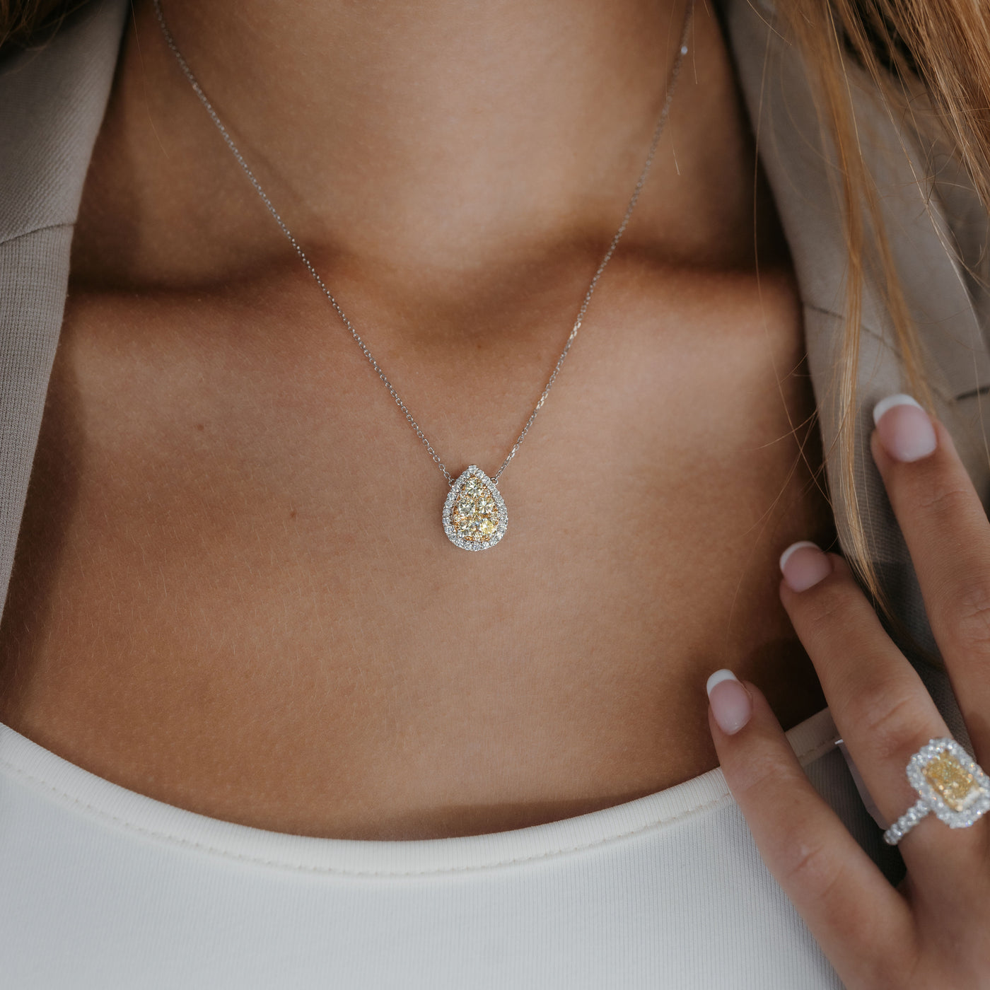 yellow and white diamond halo necklace