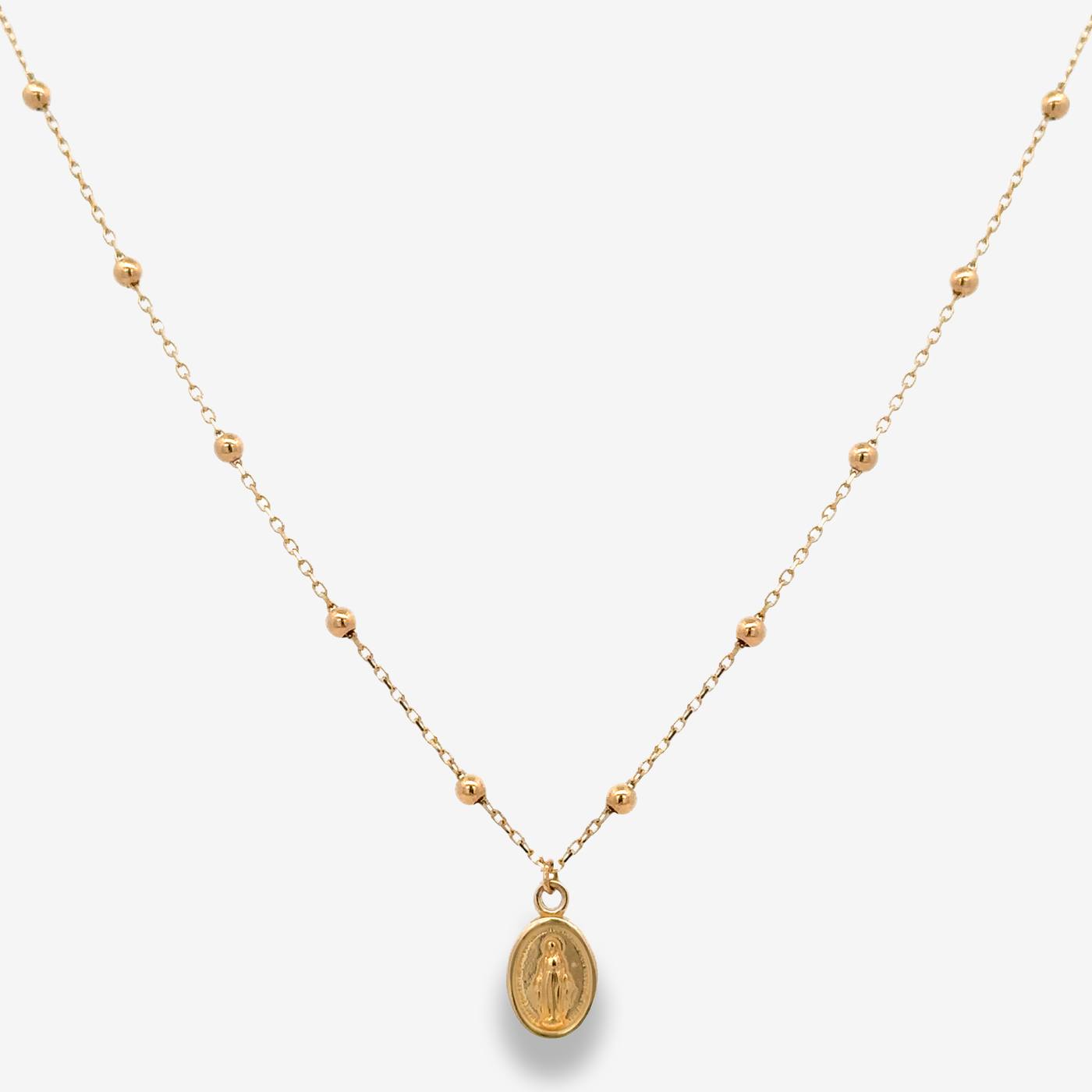Virgin Mary and gold bead necklace