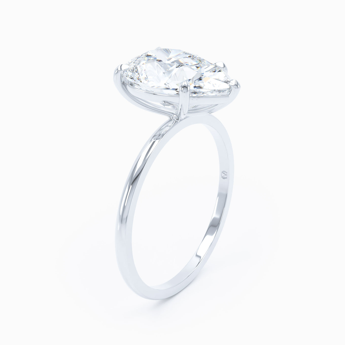 Petite Solitaire Pear Engagement Ring