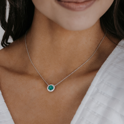 emerald and diamond halo necklace