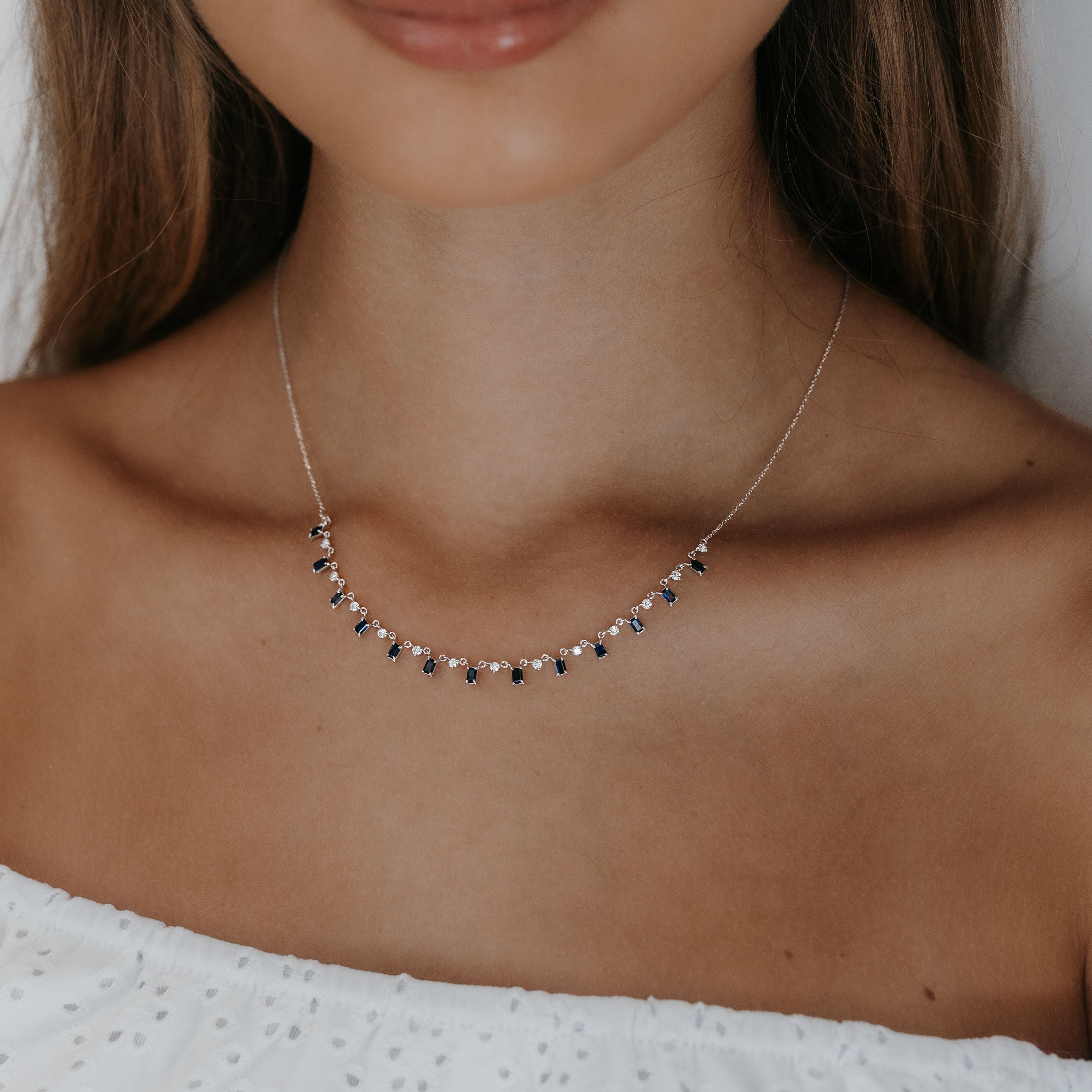 white gold diamond and sapphire ring