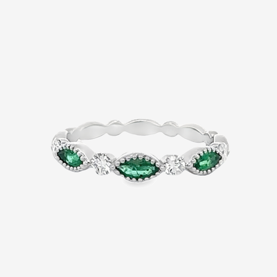 emerald and diamond ring with milgrain details