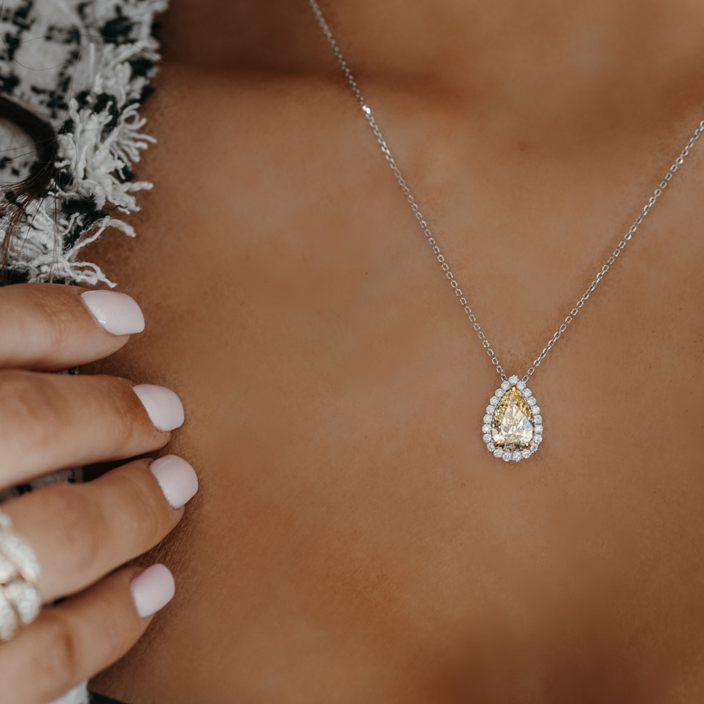 yellow an white diamond halo necklace