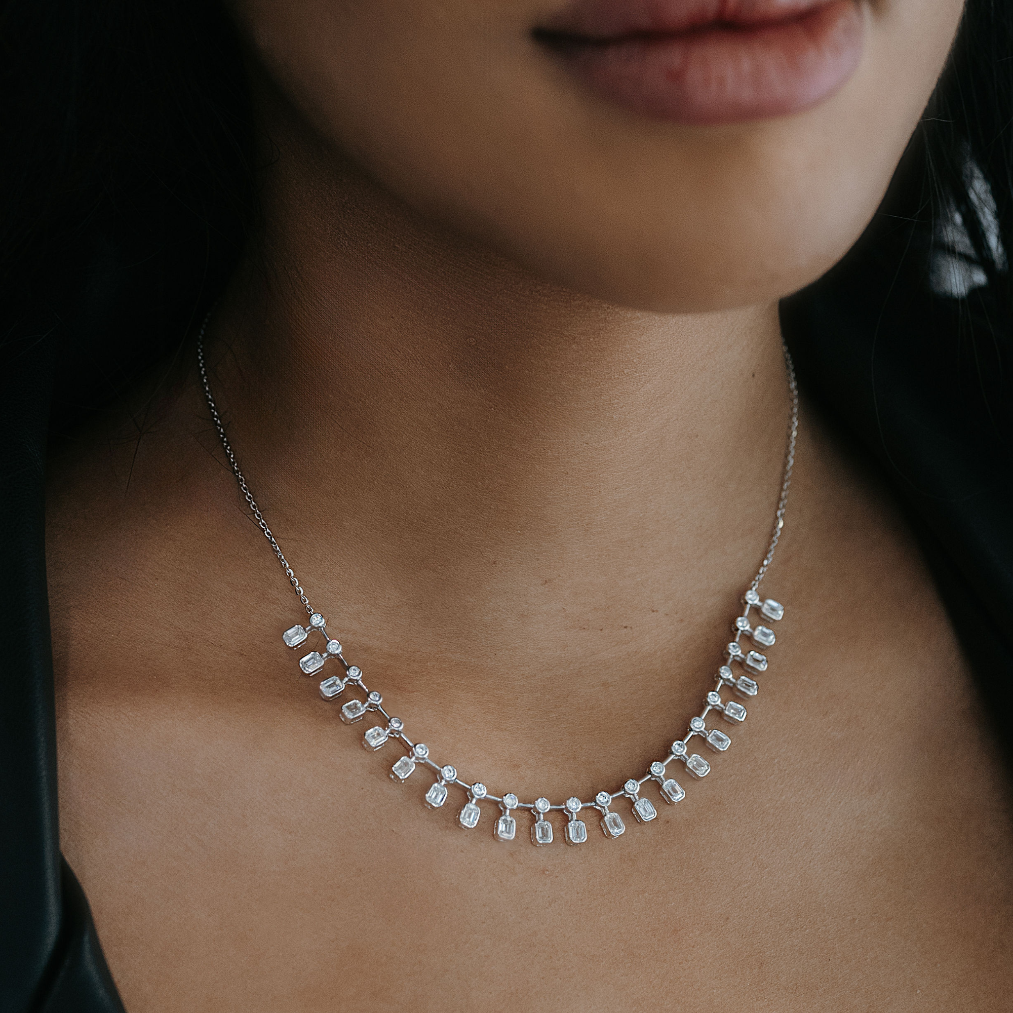 drops by the yard emerald and round cut diamond necklace