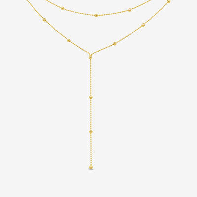 double row gold bead station lariat necklace