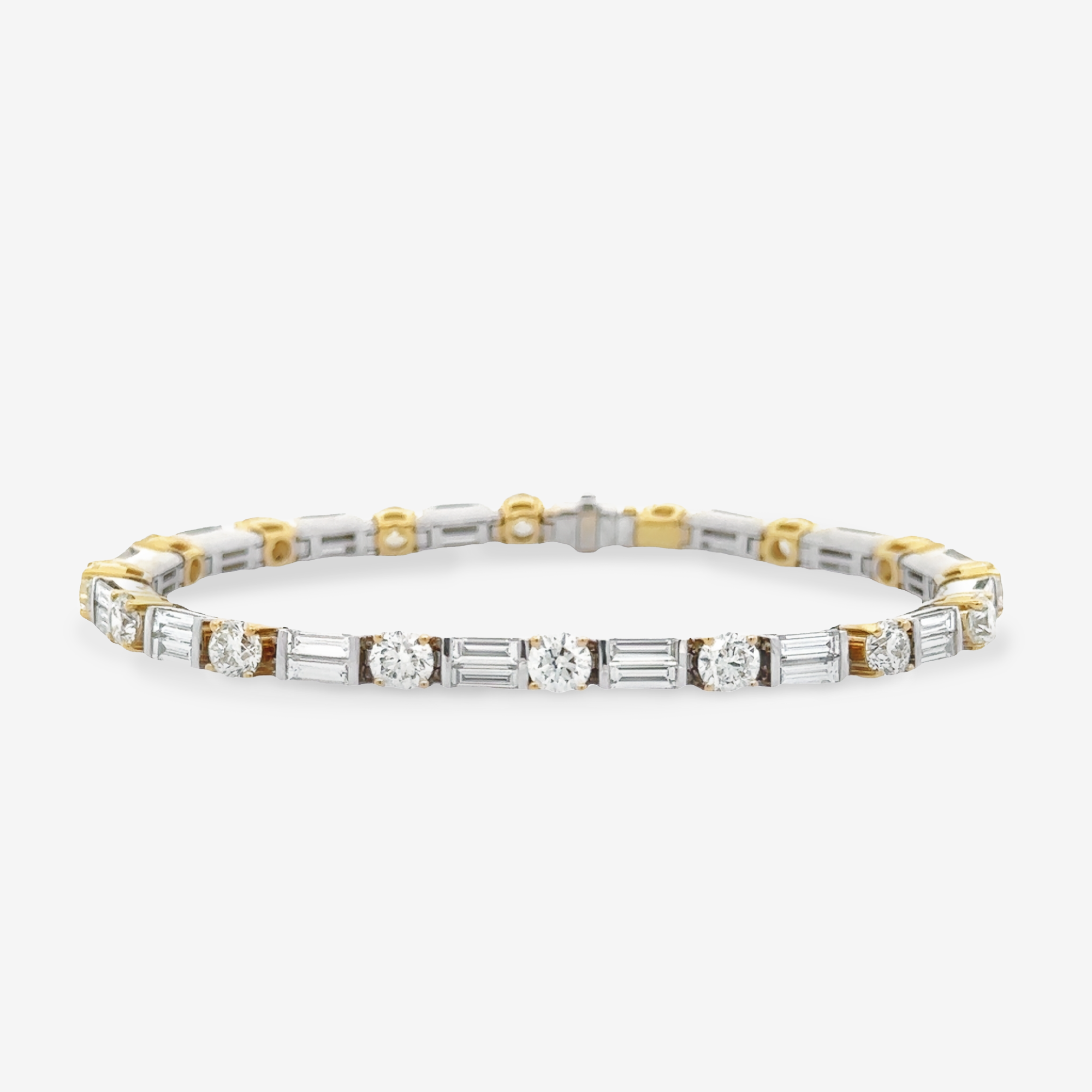 two tone gold round and baguette cut diamond tennis bracelet