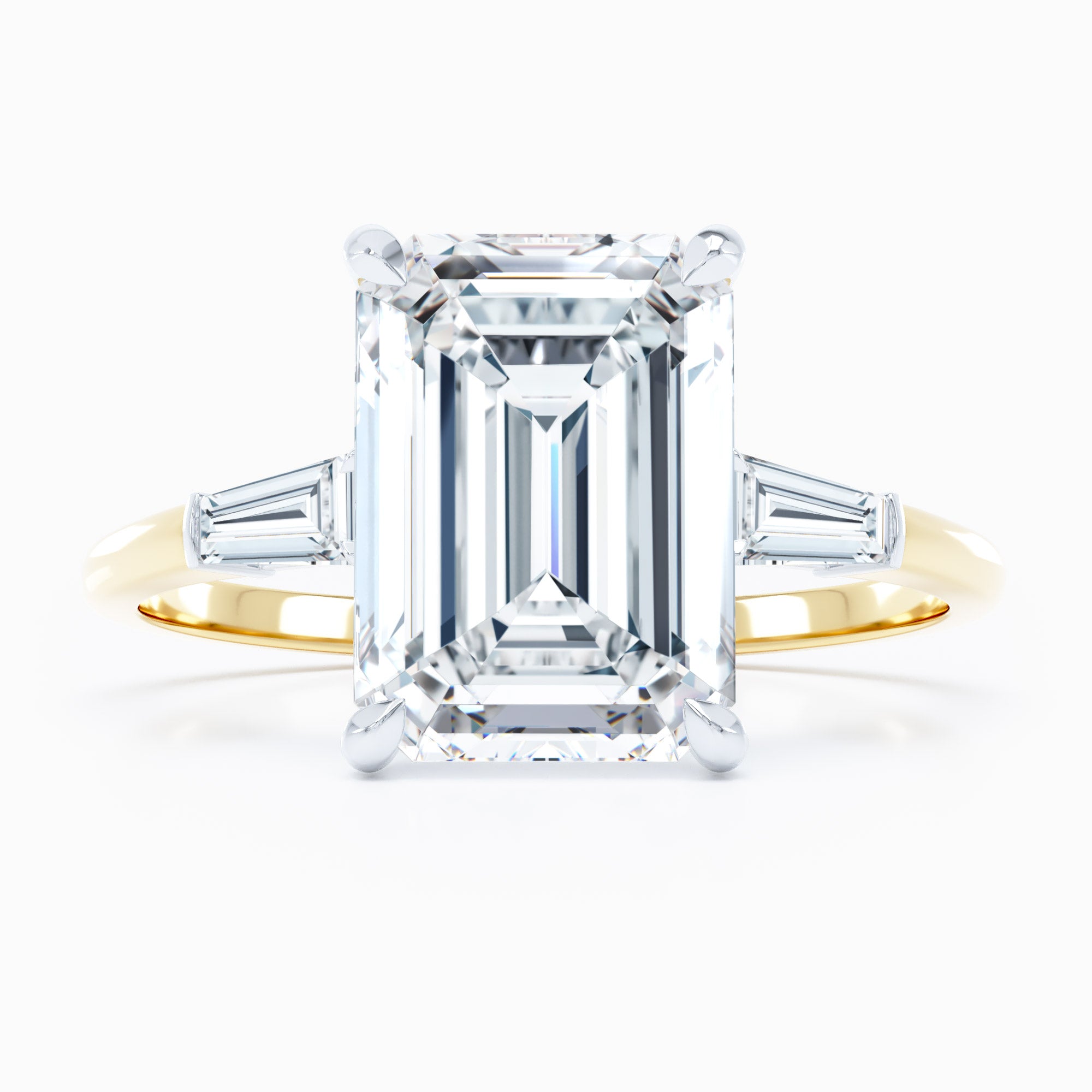 three stone emerald cut diamond engagement ring