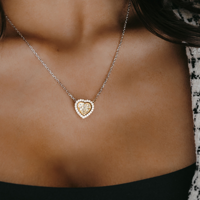 heart shaped yellow diamond necklace with white diamond halo