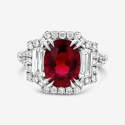 ruby and diamond three stone halo cocktail ring
