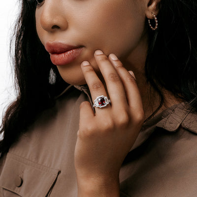 ruby and diamond three stone halo cocktail ring