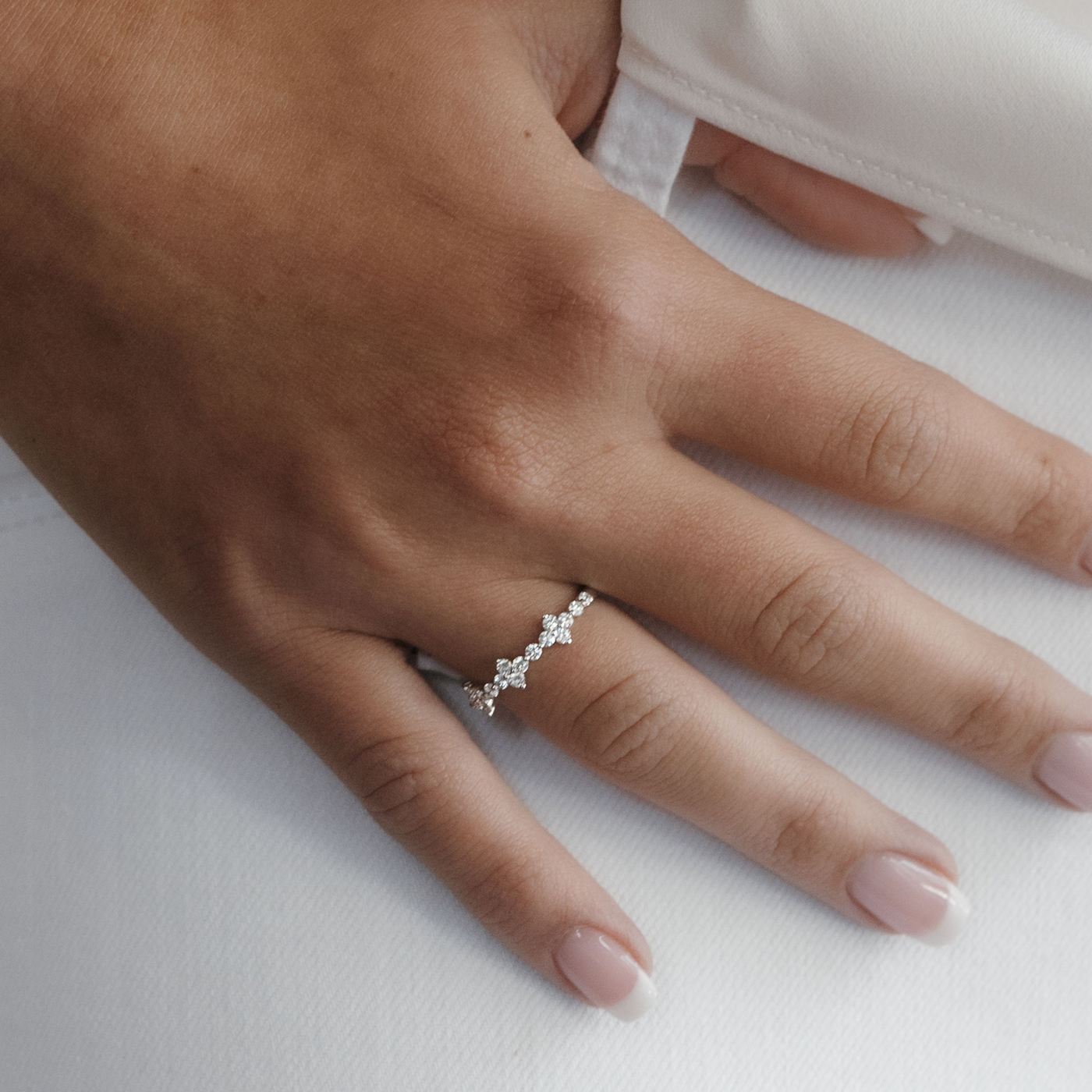 diamond floral and white gold bead ring