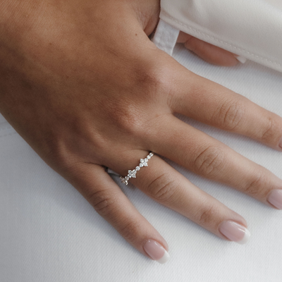 diamond floral and white gold bead ring