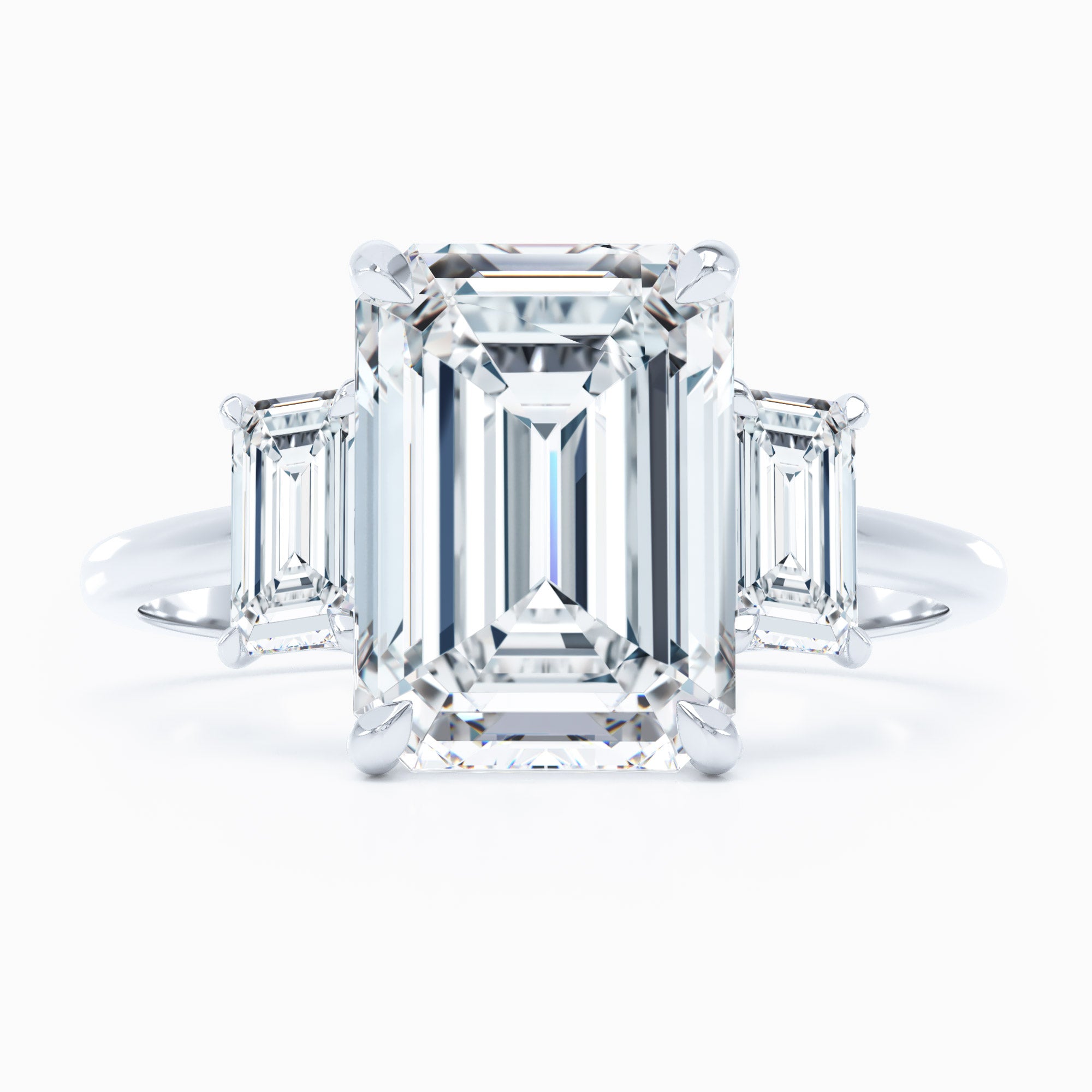 white gold three stone emerald cut diamond engagement ring