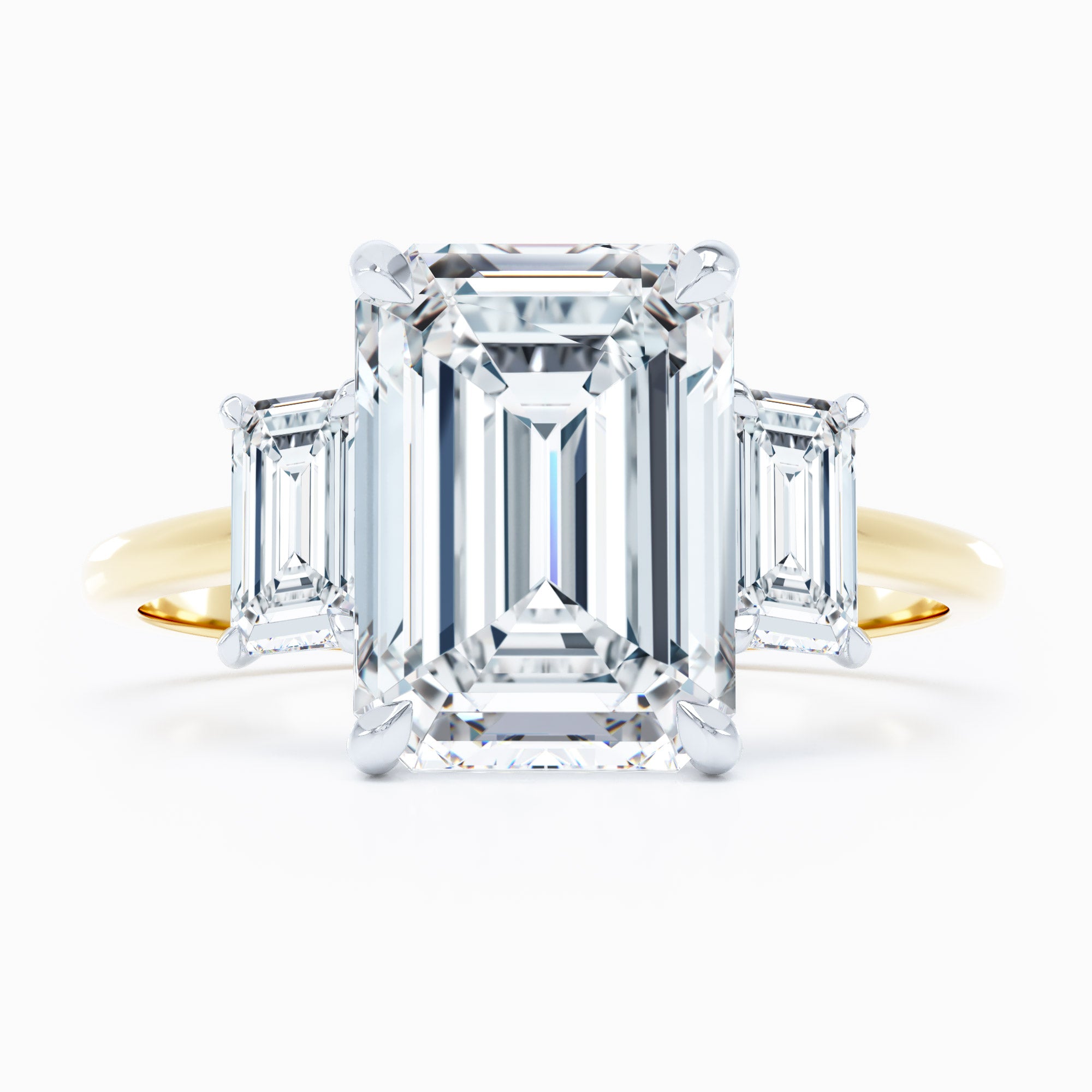 three stone emerald cut diamond engagement ring