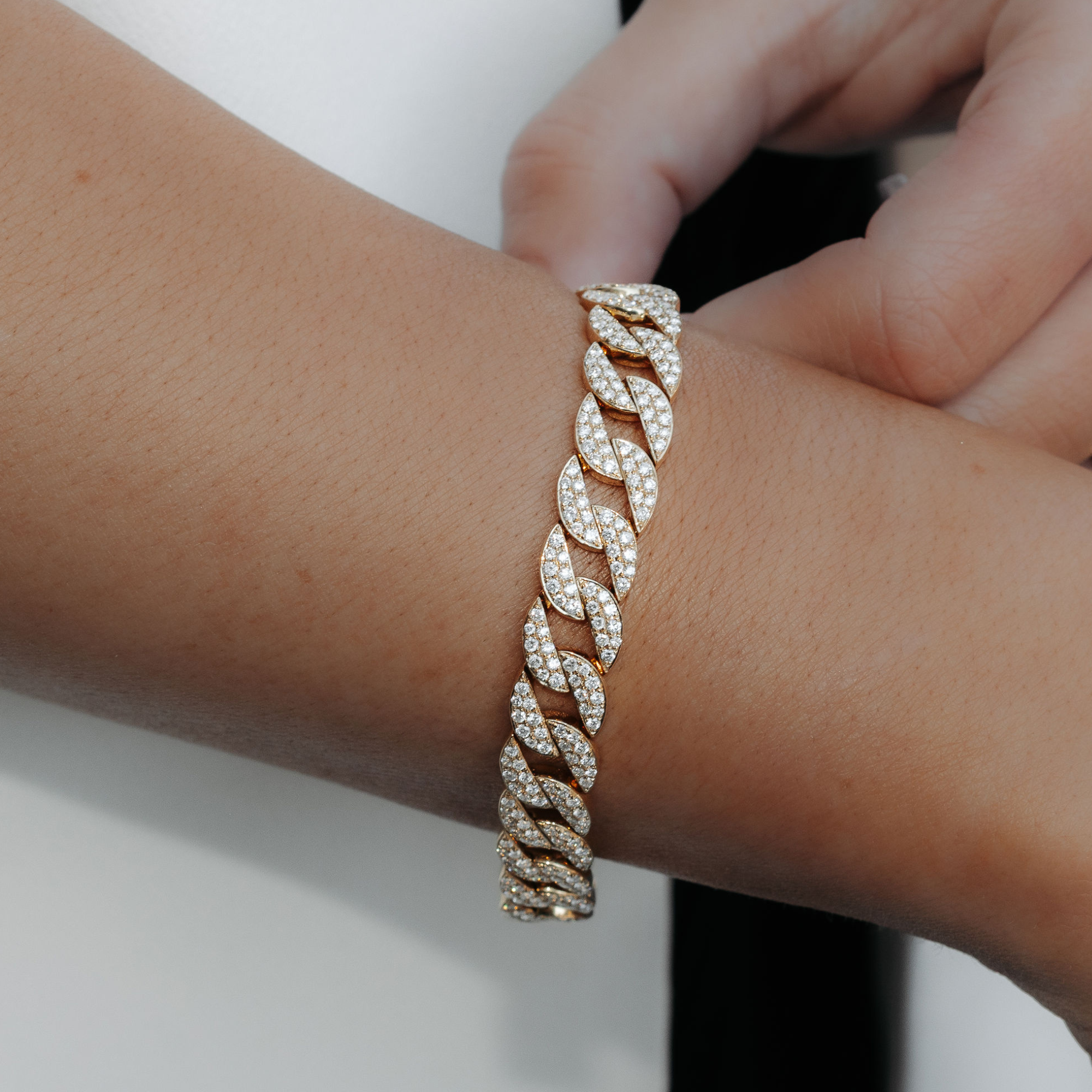 diamond covered cuban link bracelet