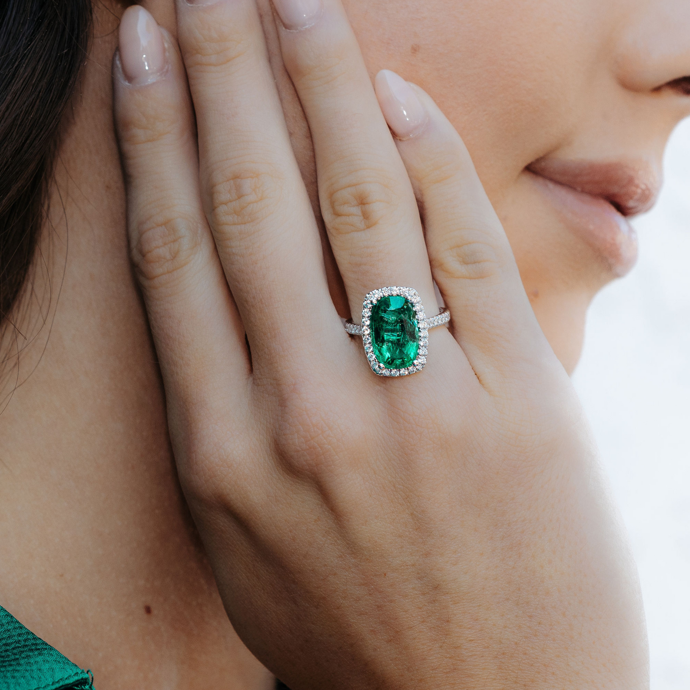 emerald and diamond halo ring