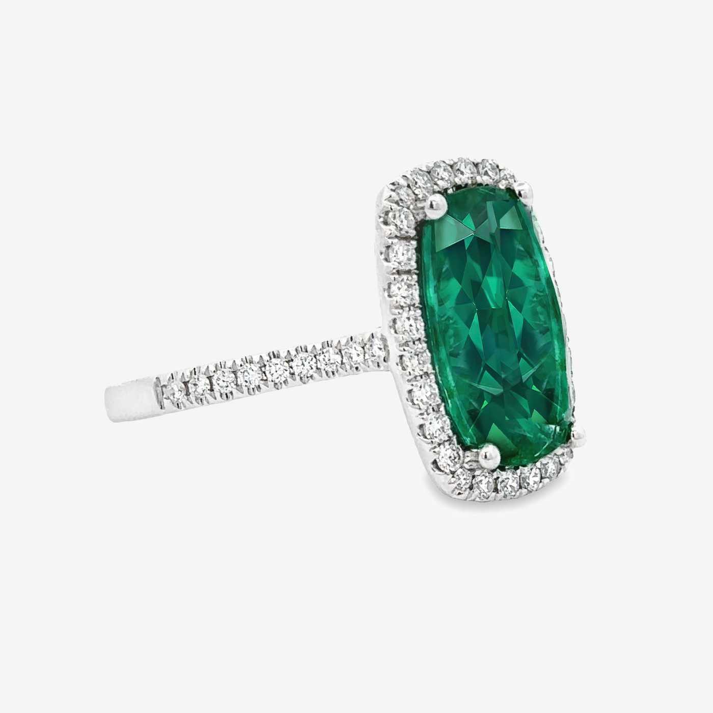 emerald and diamond halo ring