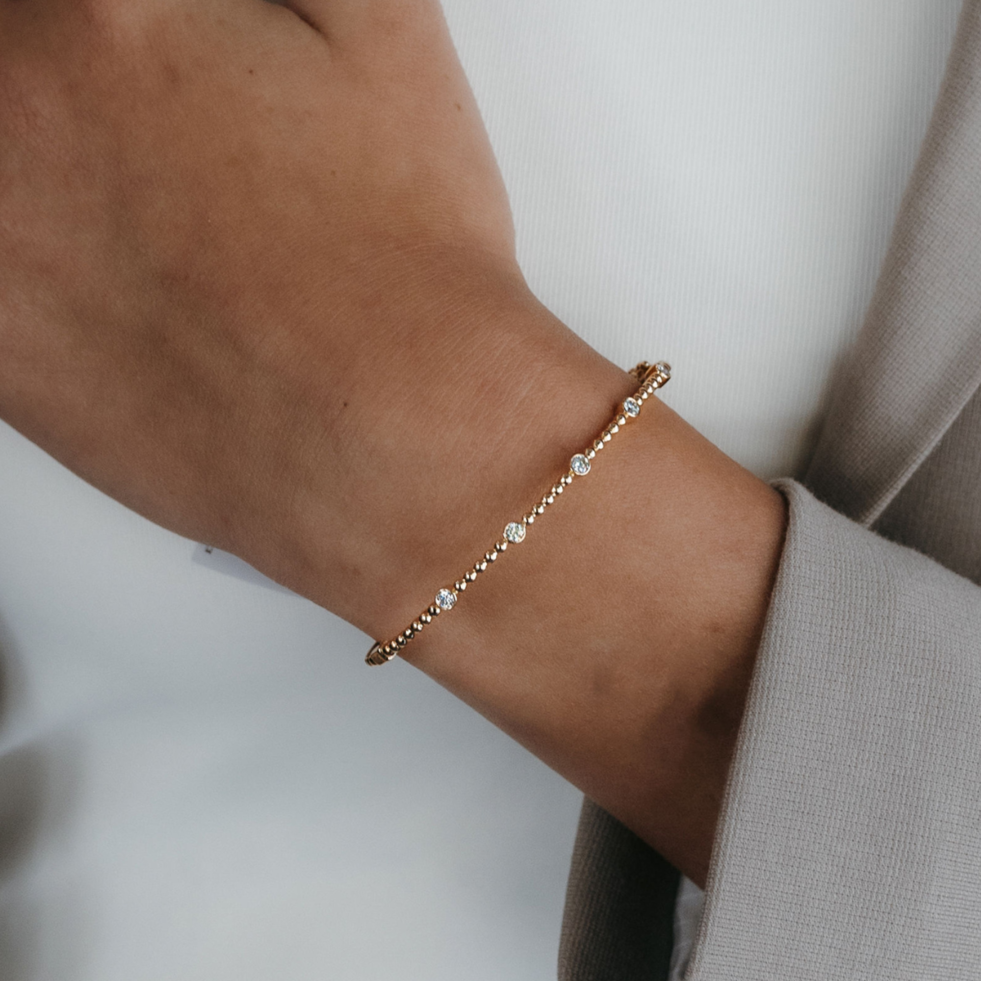 diamond and gold bead bangle bracelet