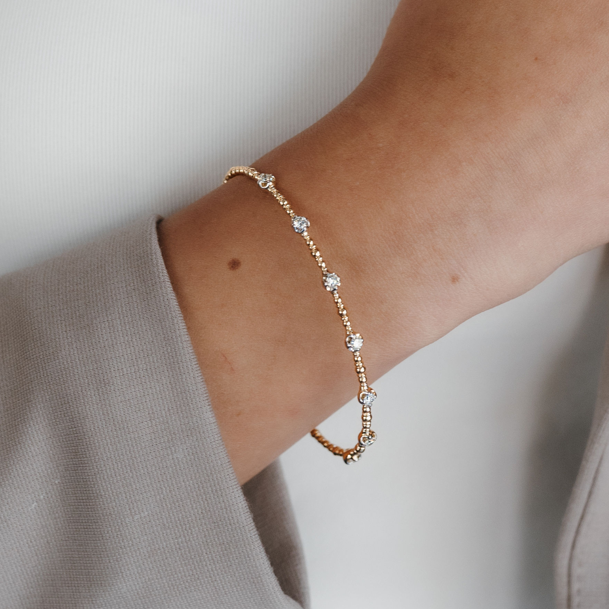 diamond and gold bead bangle bracelet
