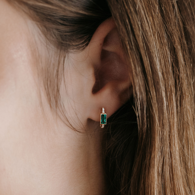 emerald and diamond huggie earrings