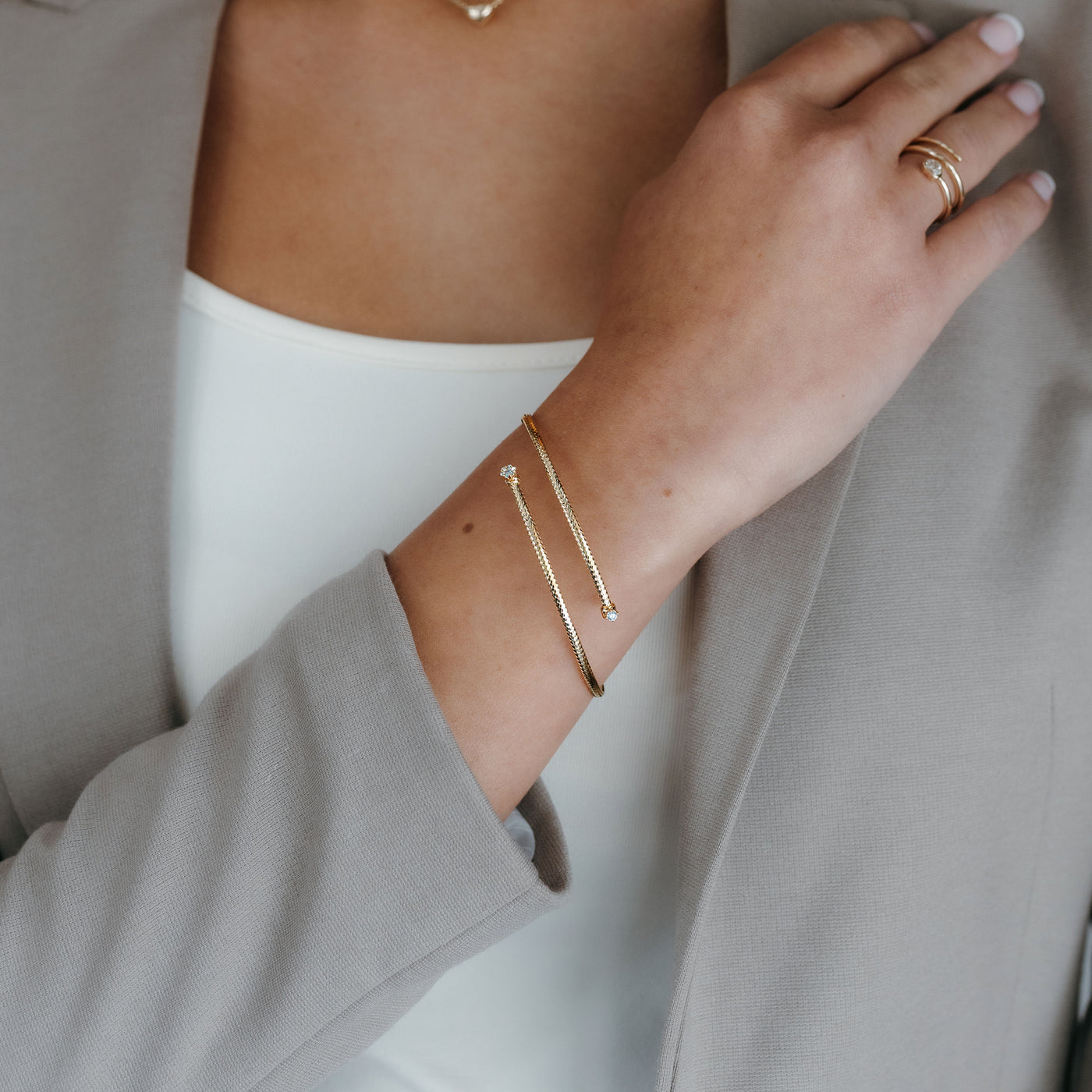 gold and diamond bypass bracelet