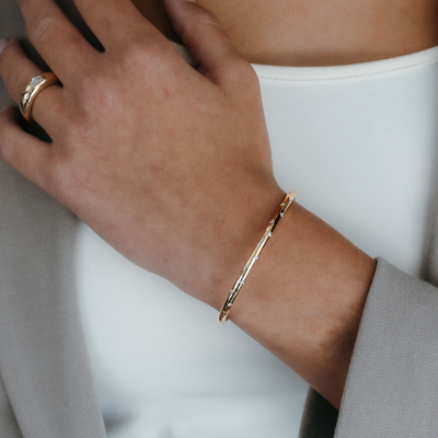 burnished diamond and gold bangle bracelet