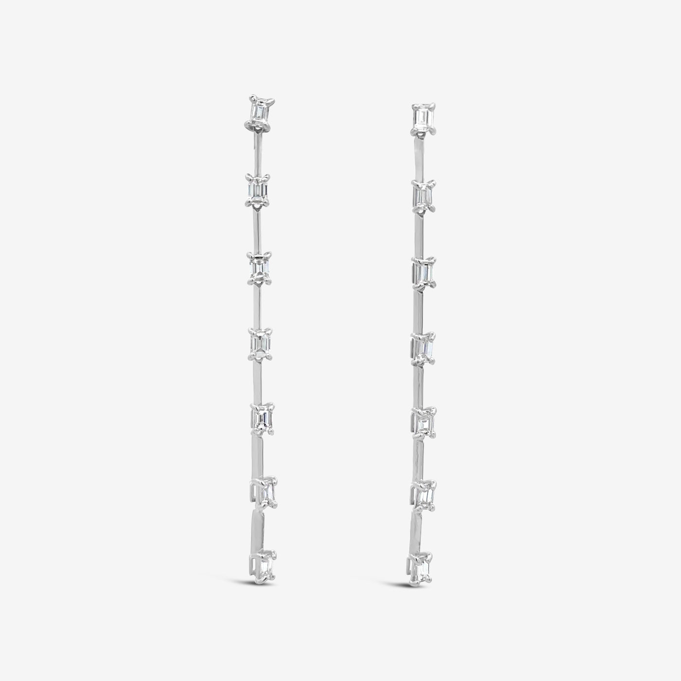 emerald cut diamond dangle earrings