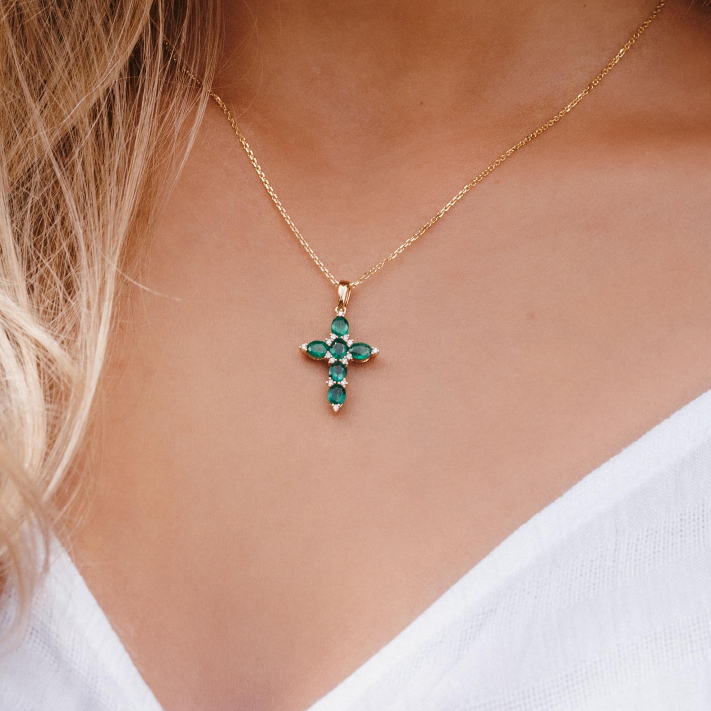 emerald and diamond cross pendant