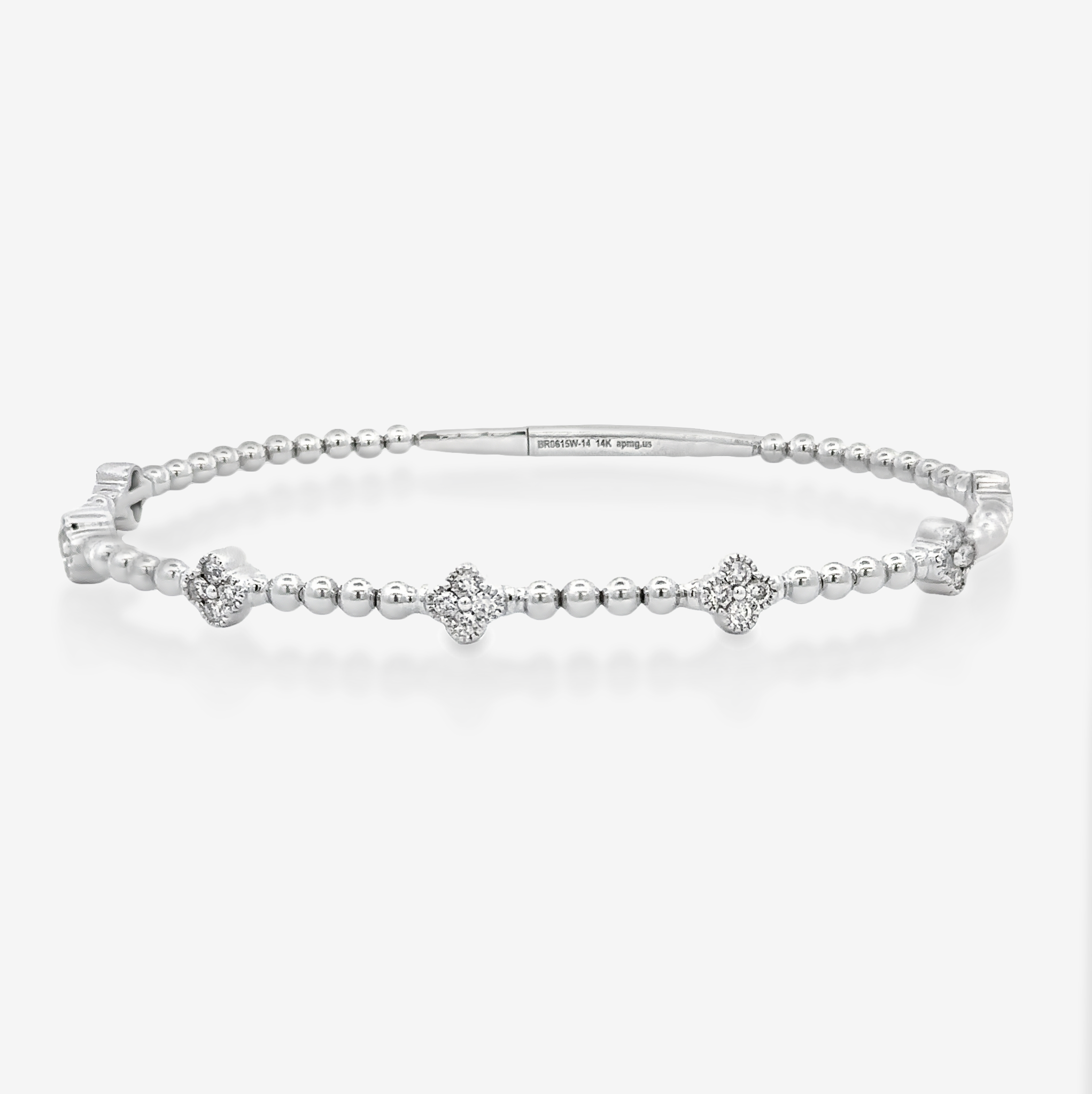 floral motif and gold bead bracelet