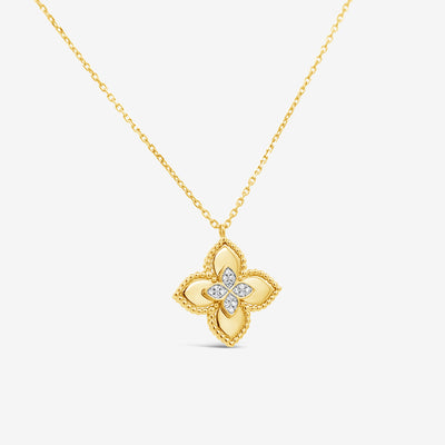 floral diamond and gold pendant