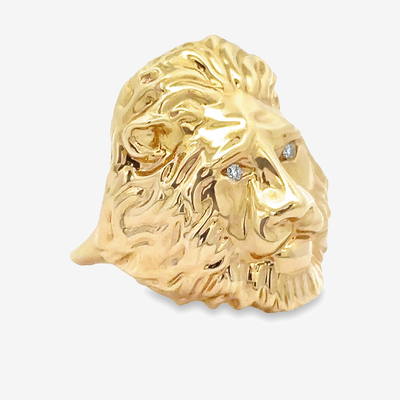 gold lions head with diamond eyes ring