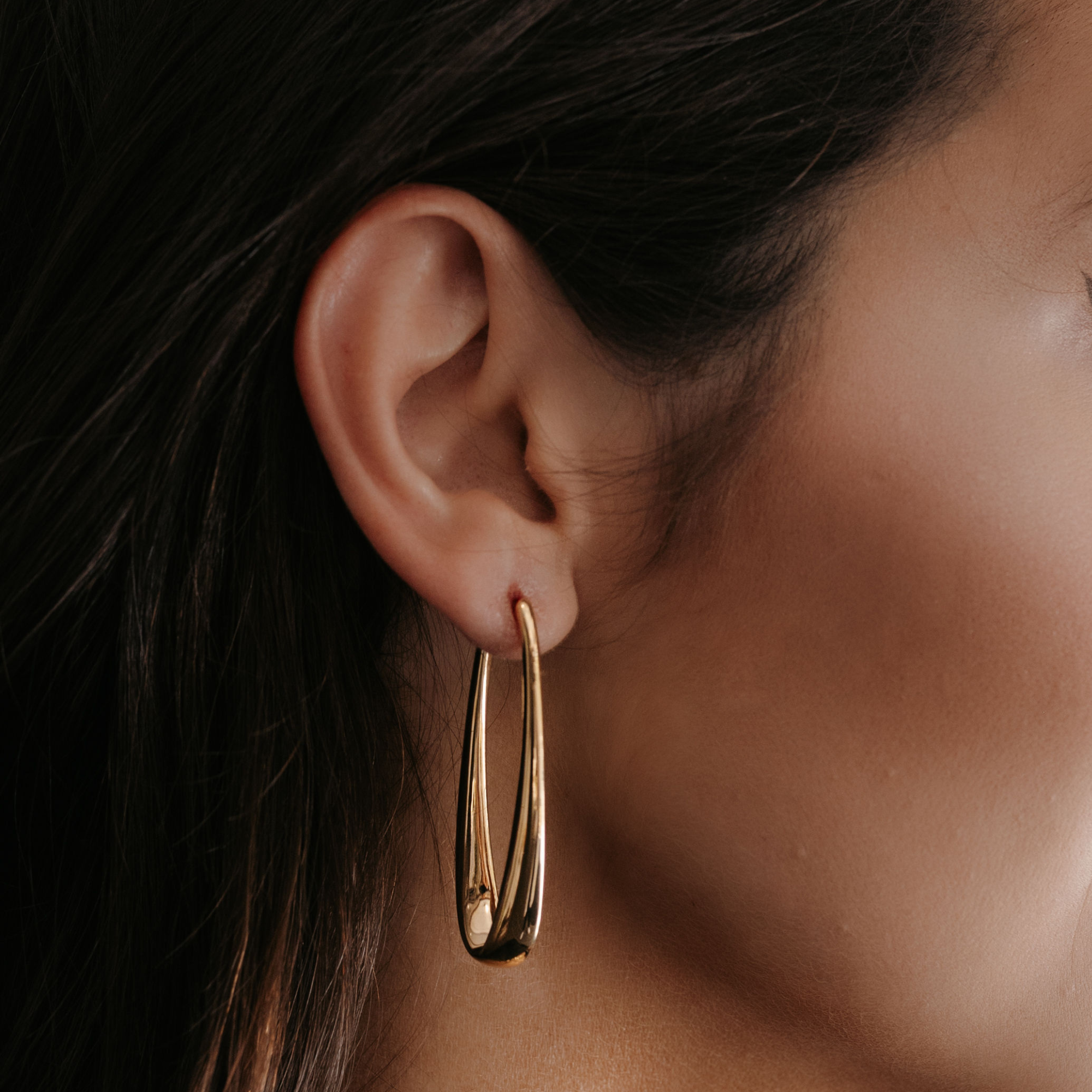 gold tapered oval hoop earrings