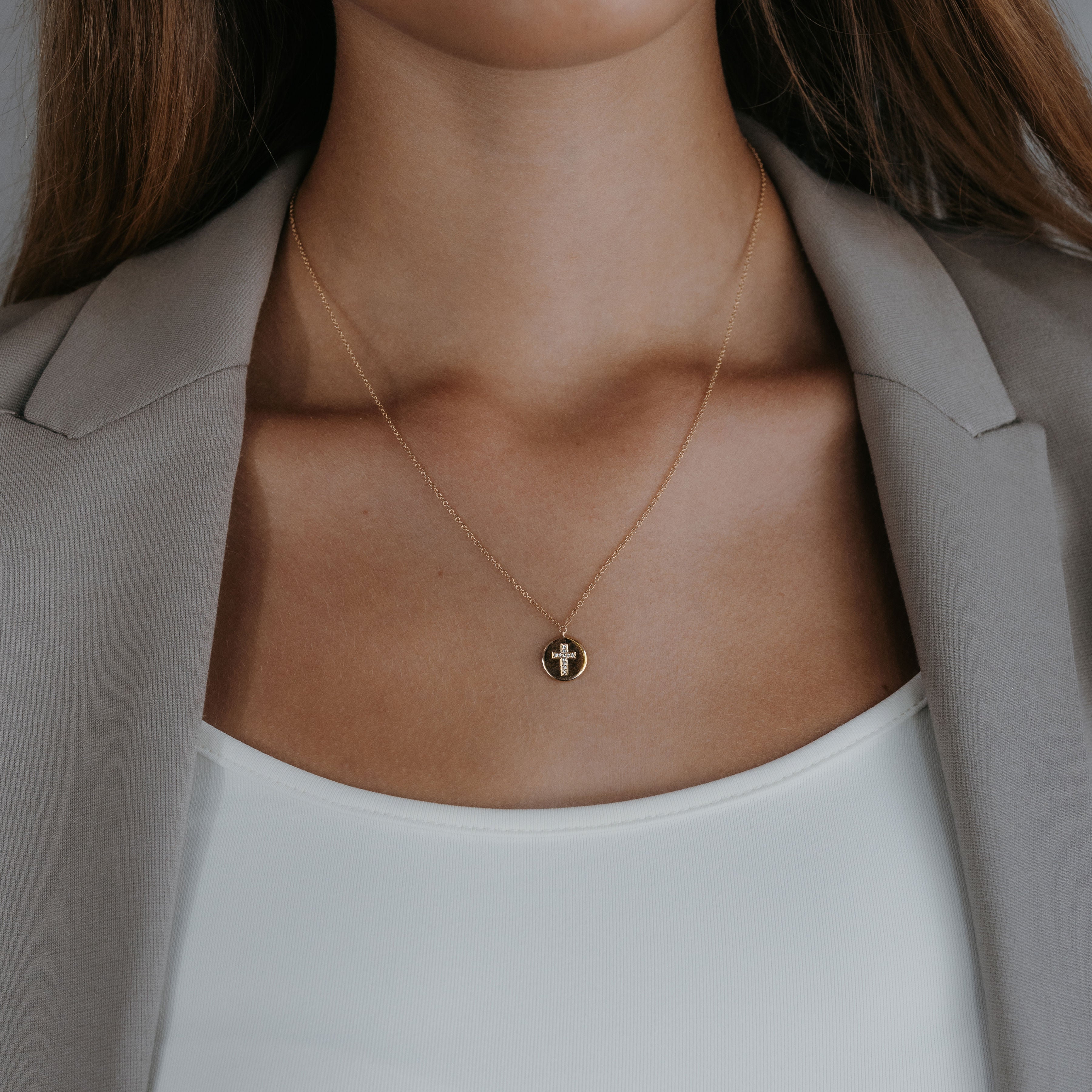 gold medallion necklace with diamond cross