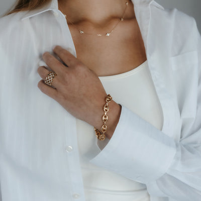 gold puffed anchor link bracelet