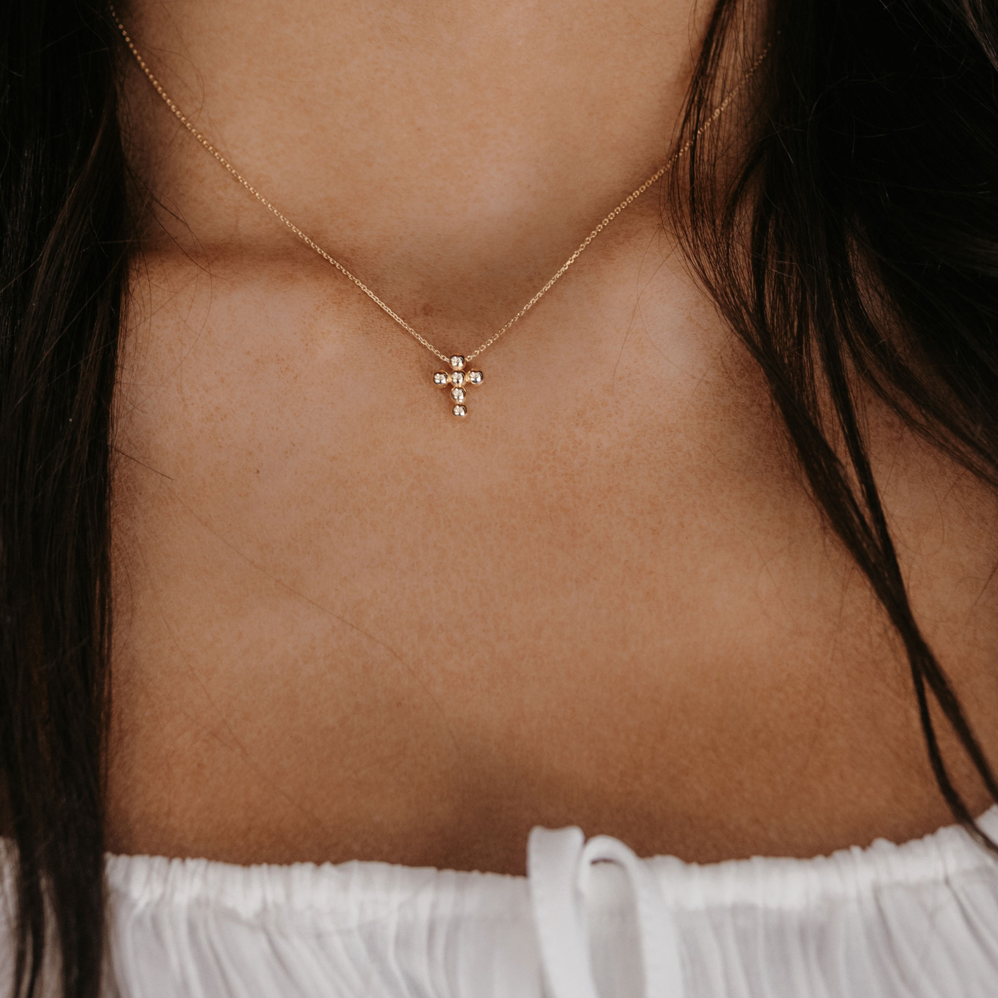 gold bead cross necklace