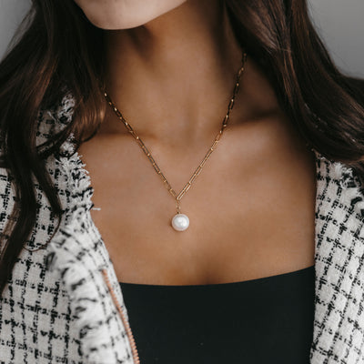 pearl drop necklace on gold paperclip link chain