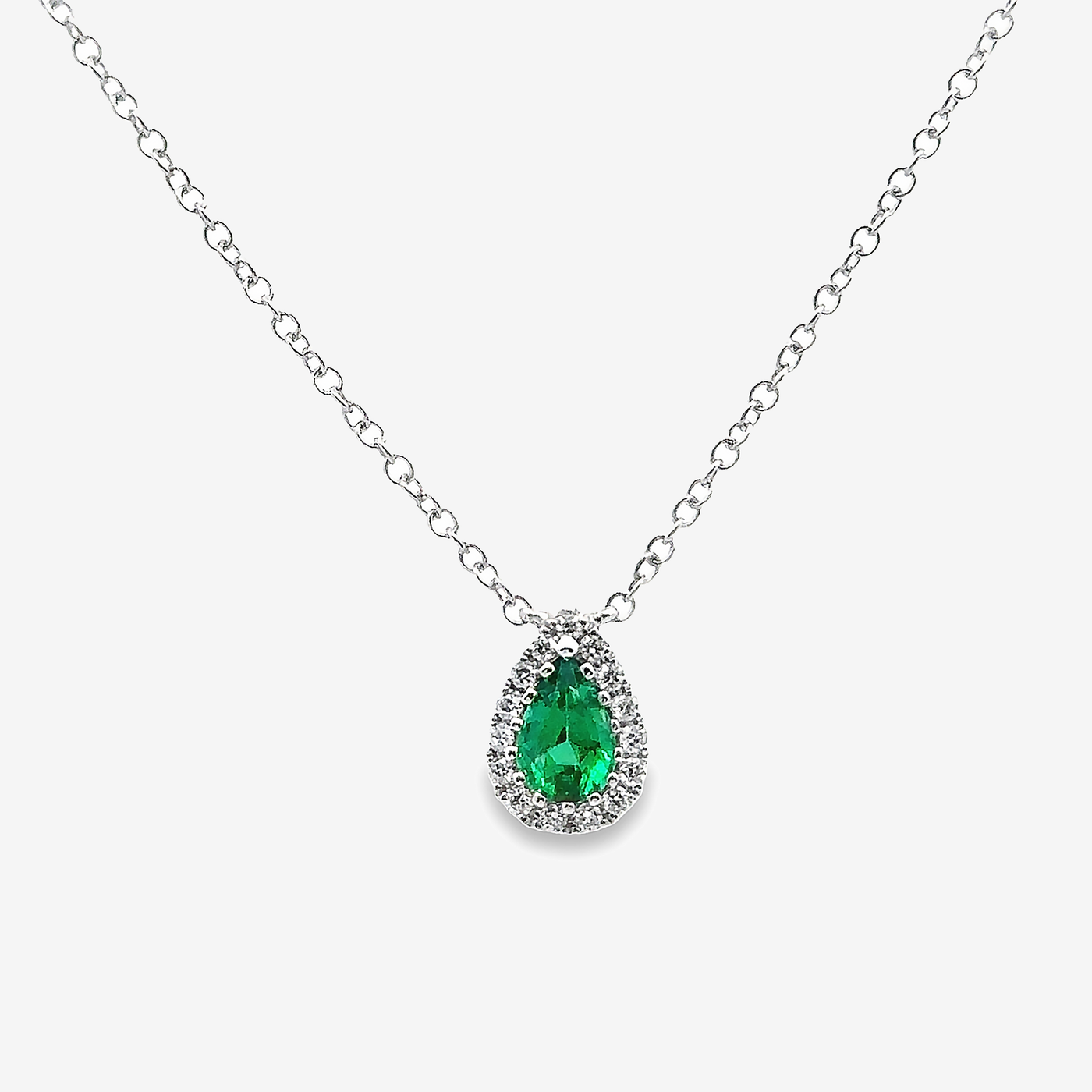 emerald and diamond halo necklace