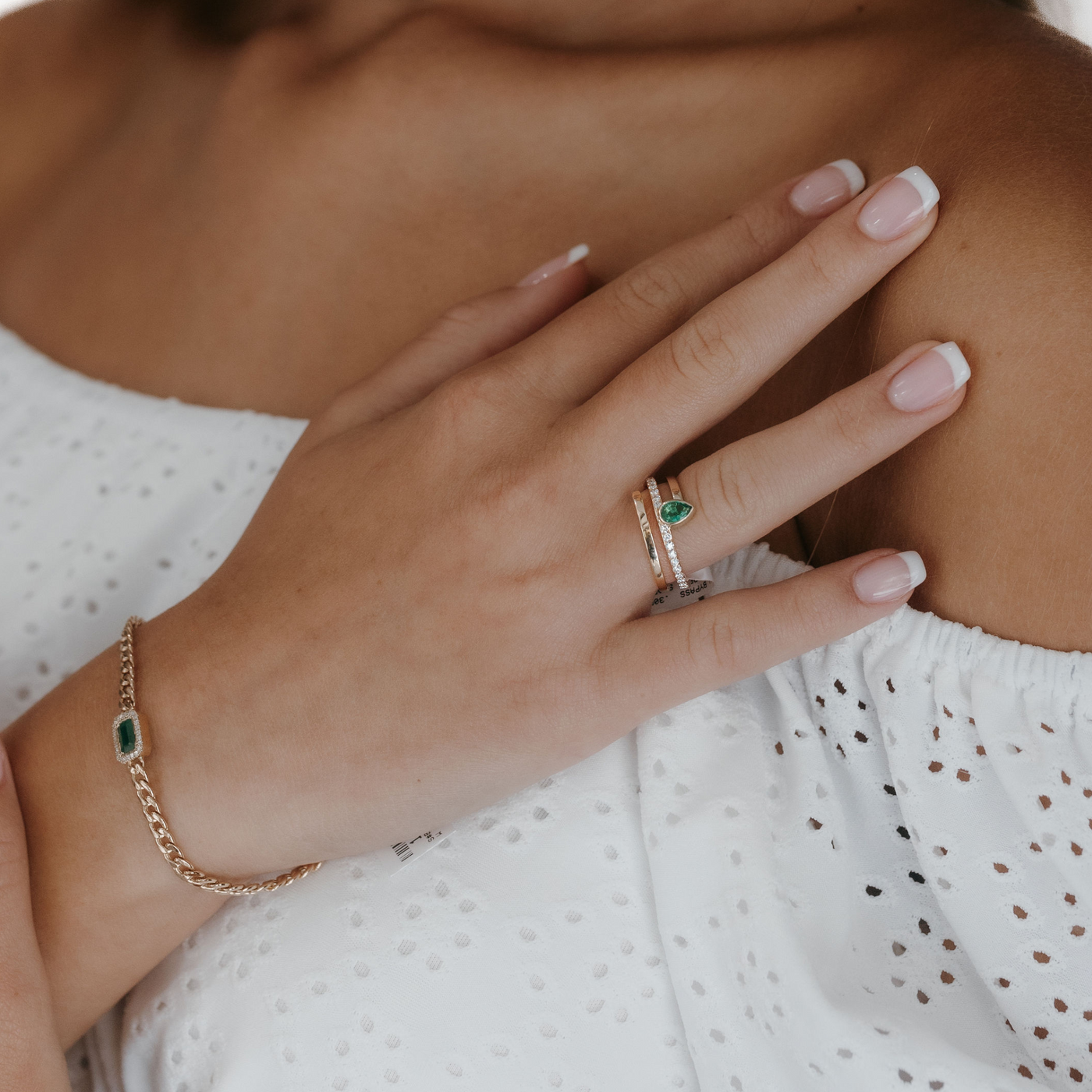 emerald and diamond spiral ring