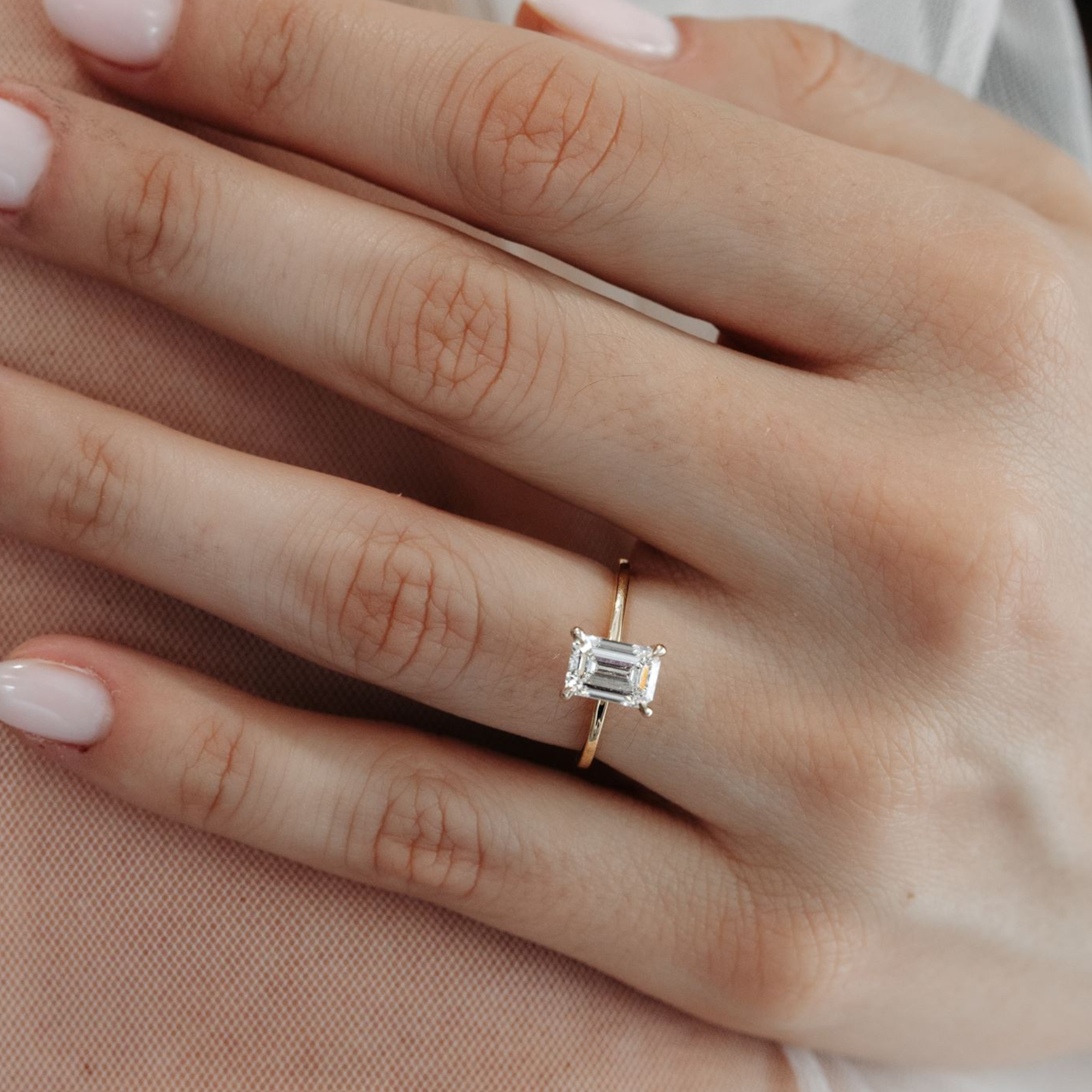 1.5 carat emerald cut diamond engagement ring