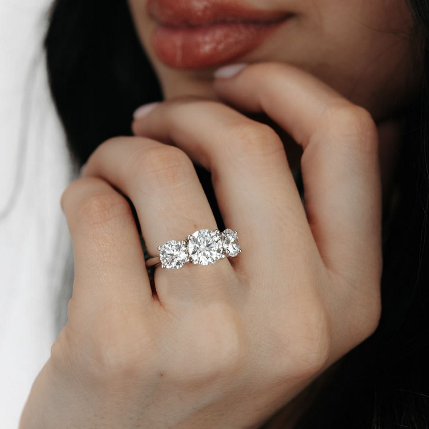 round three stone diamond engagement ring