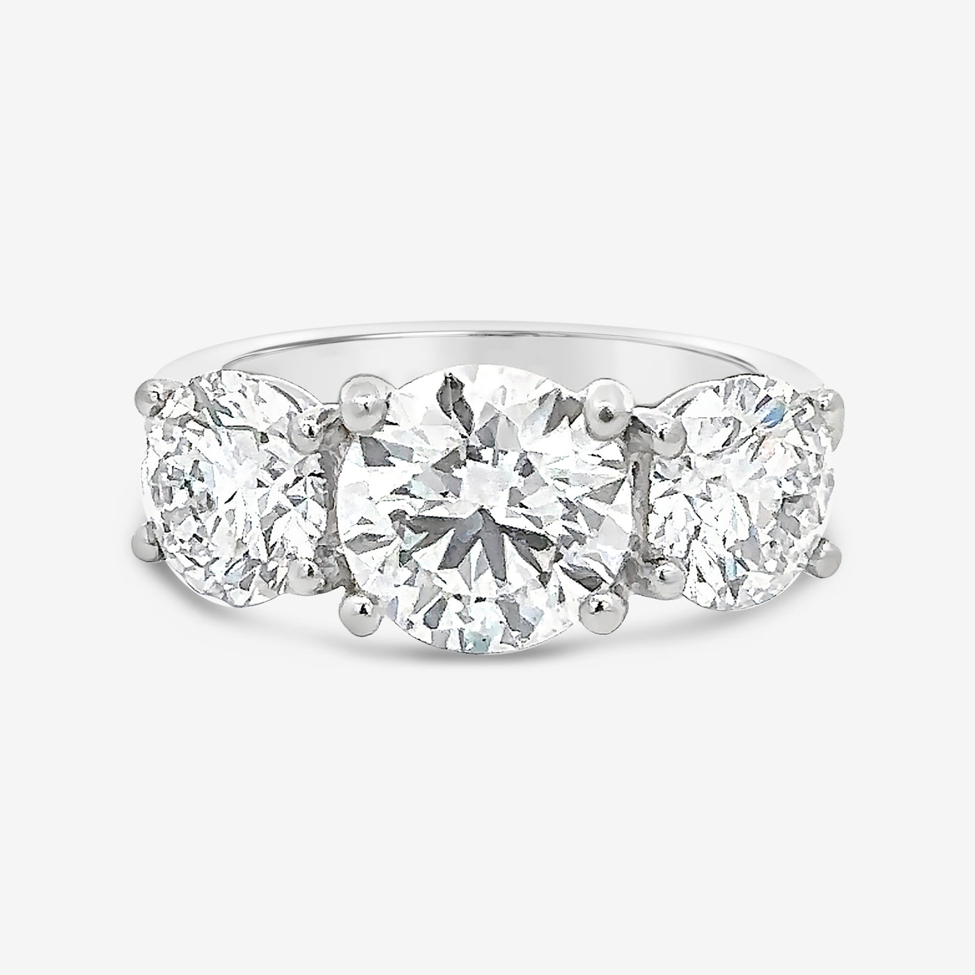 three stone round cut diamond engagement ring
