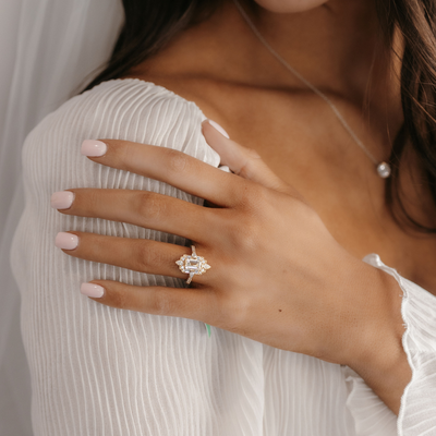 emerald cut diamond halo engagement ring