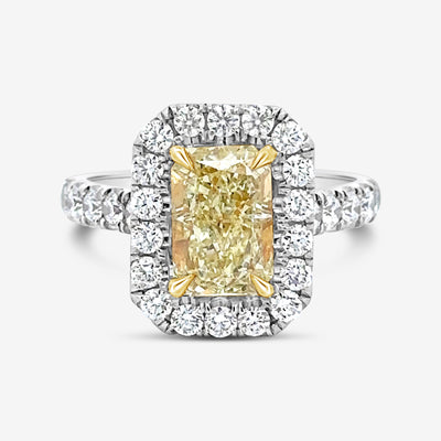 radiant cut yellow diamond and white diamond halo engagement ring