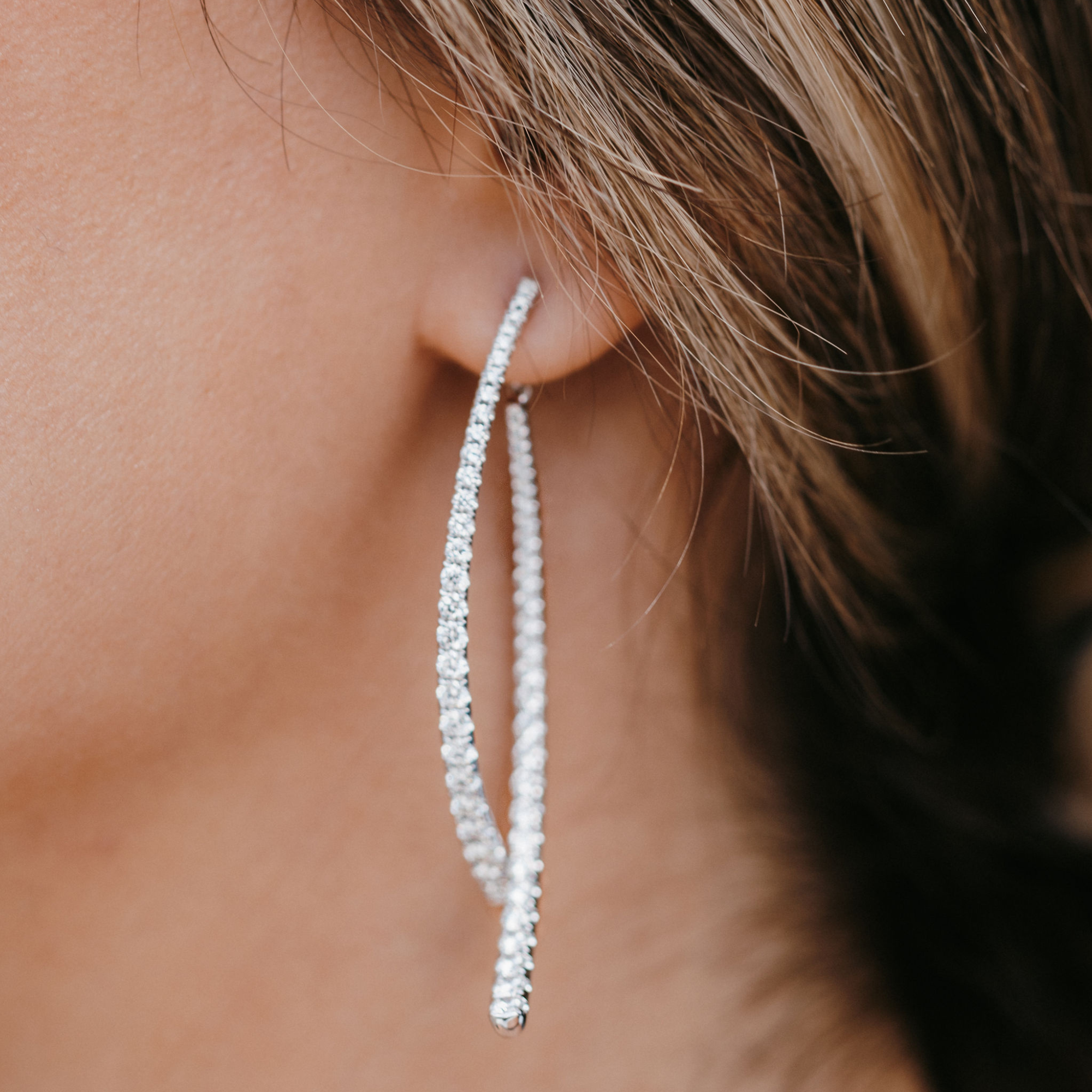 diamond covered swing earrings