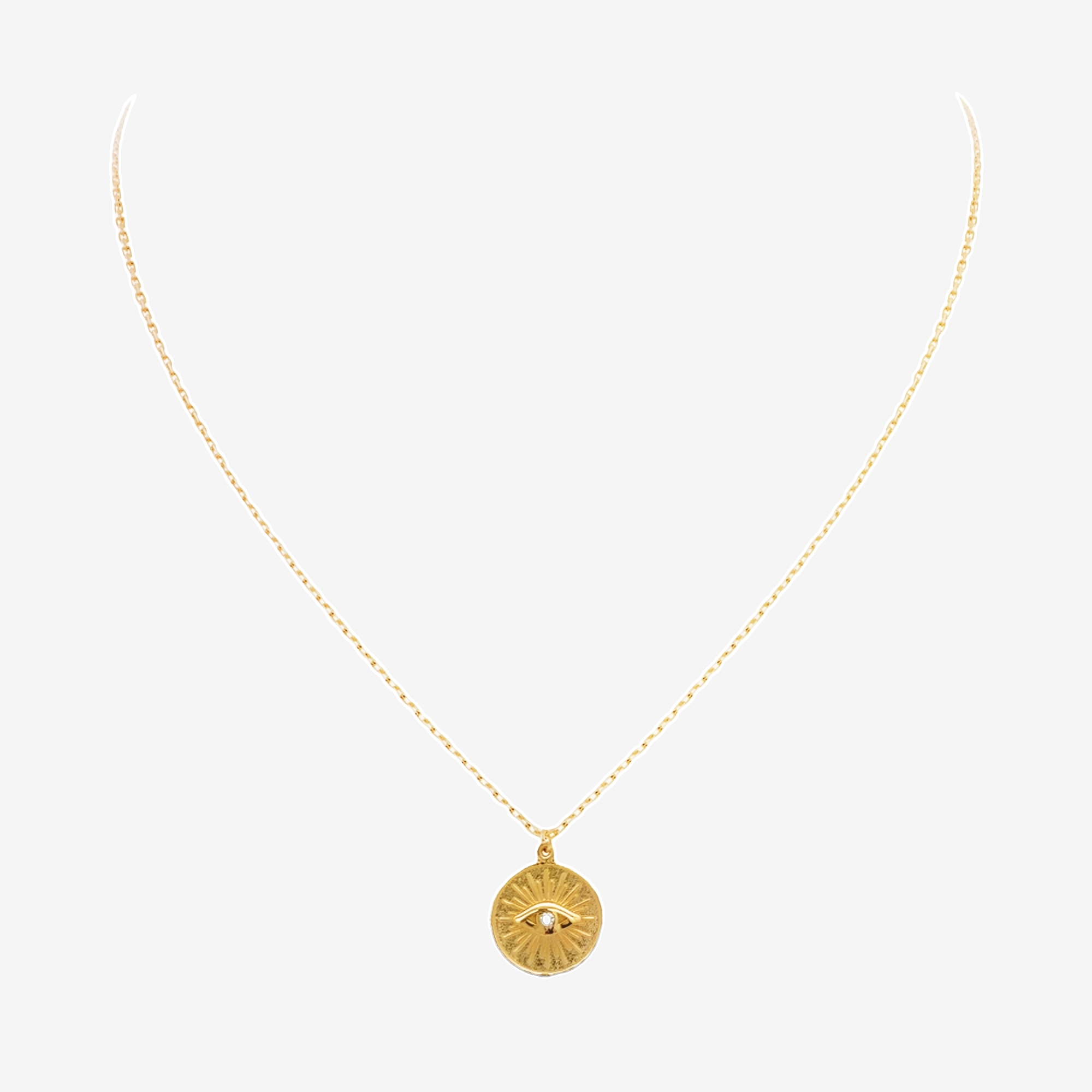 greek evil eye medallion in gold