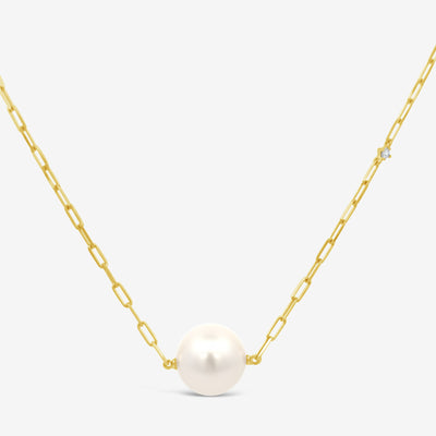 single pearl necklace on a gold paperclip chain