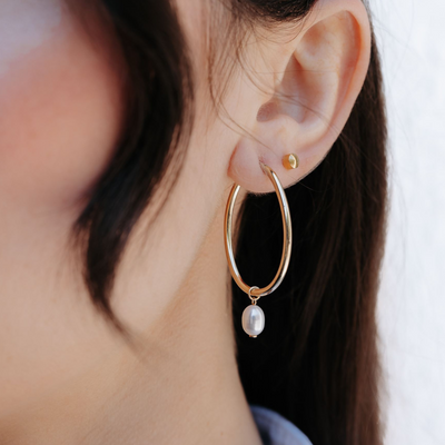 pearl drop and gold hoop earrings