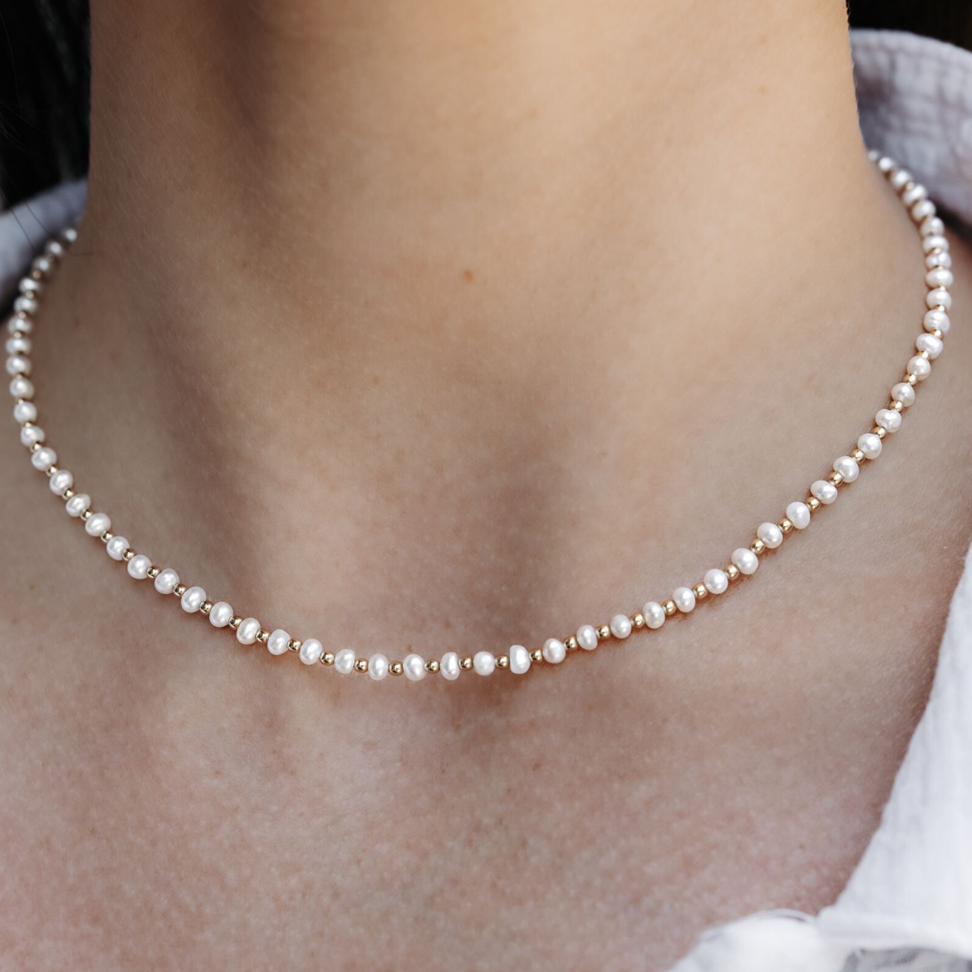 pearl and gold bead necklace