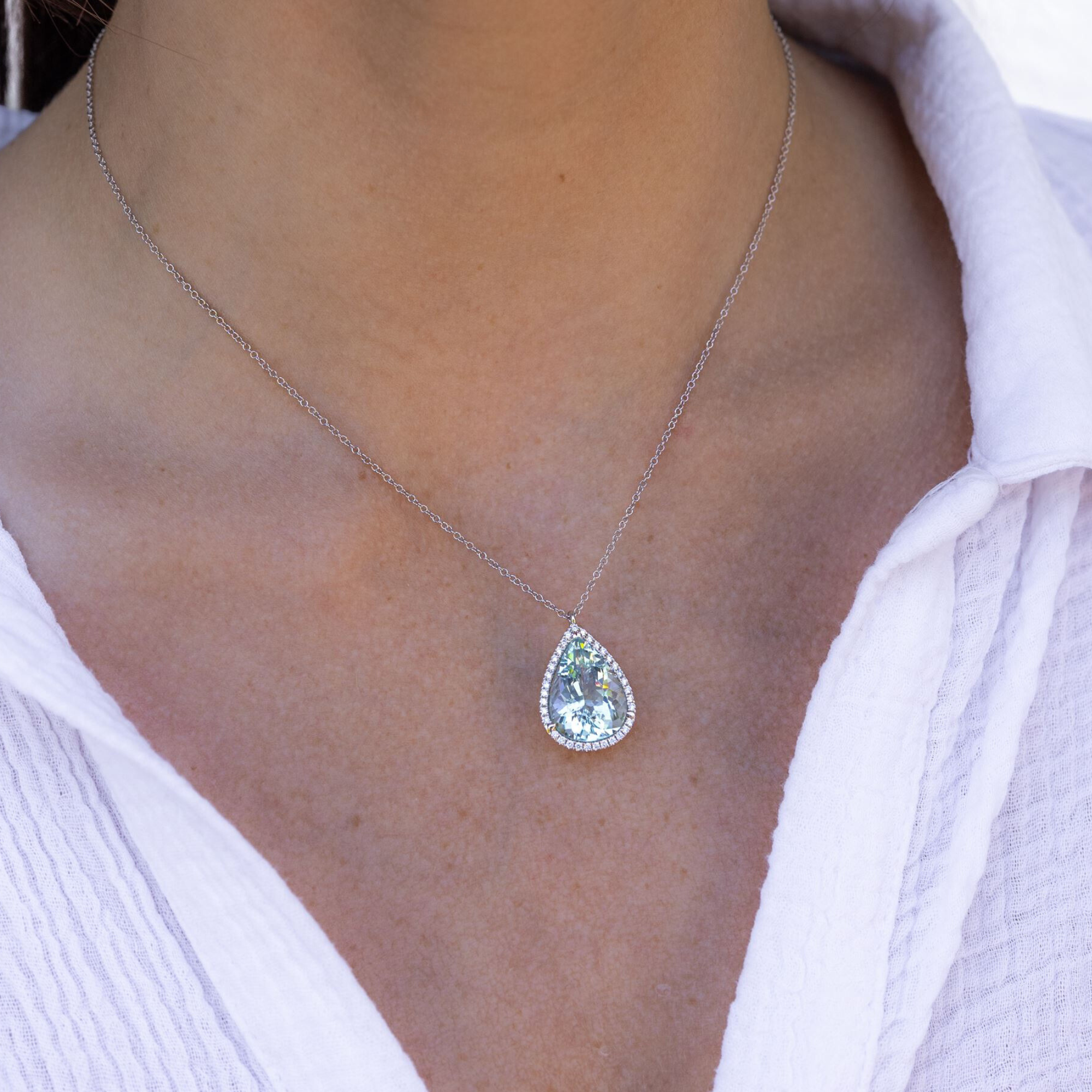 aquamarine and diamond halo necklace